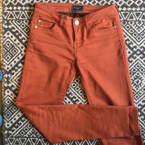 Celebrity pink orange skinny jeans